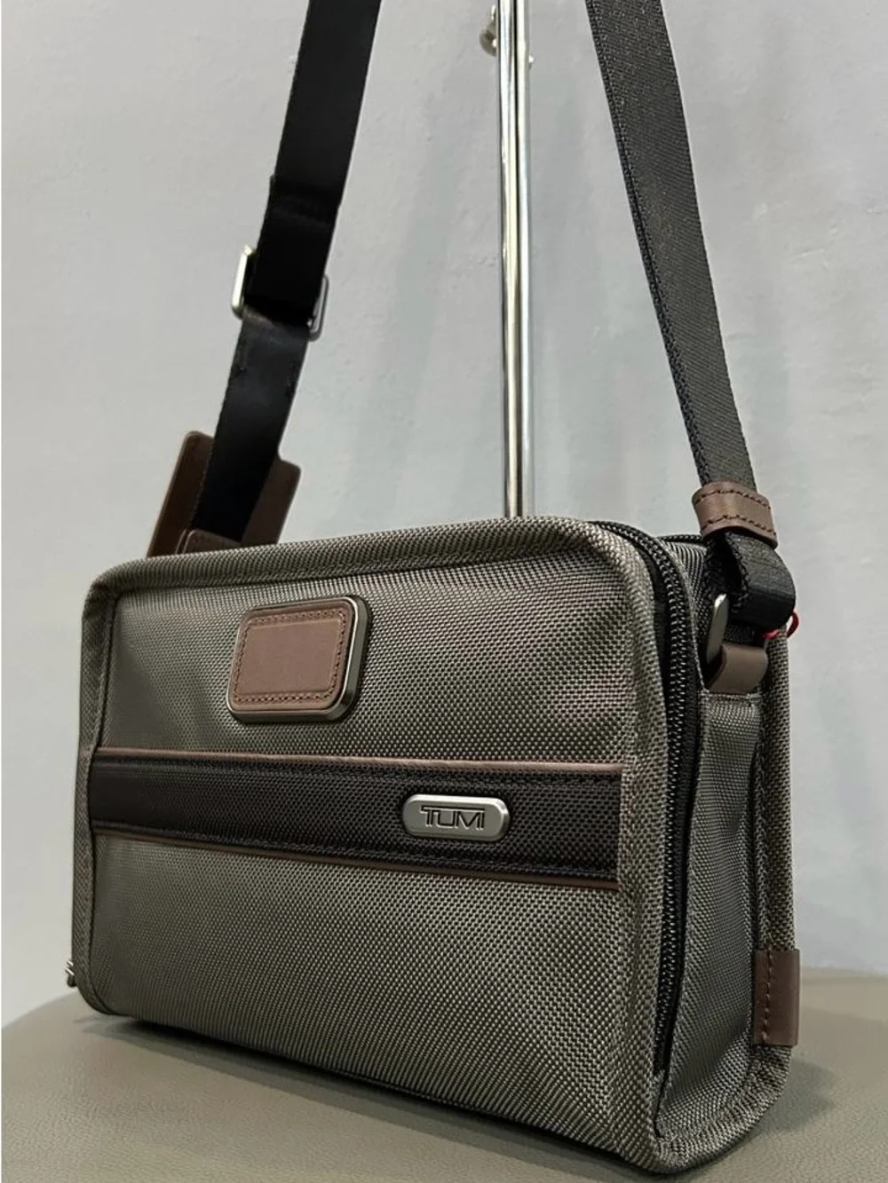 NWT TUMI Gen 4.3 East West Crossbody Castle Rock Gray & Brown